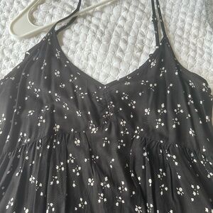 Black sundress w small ivory flowers. Back is cut out w/tie laces up.